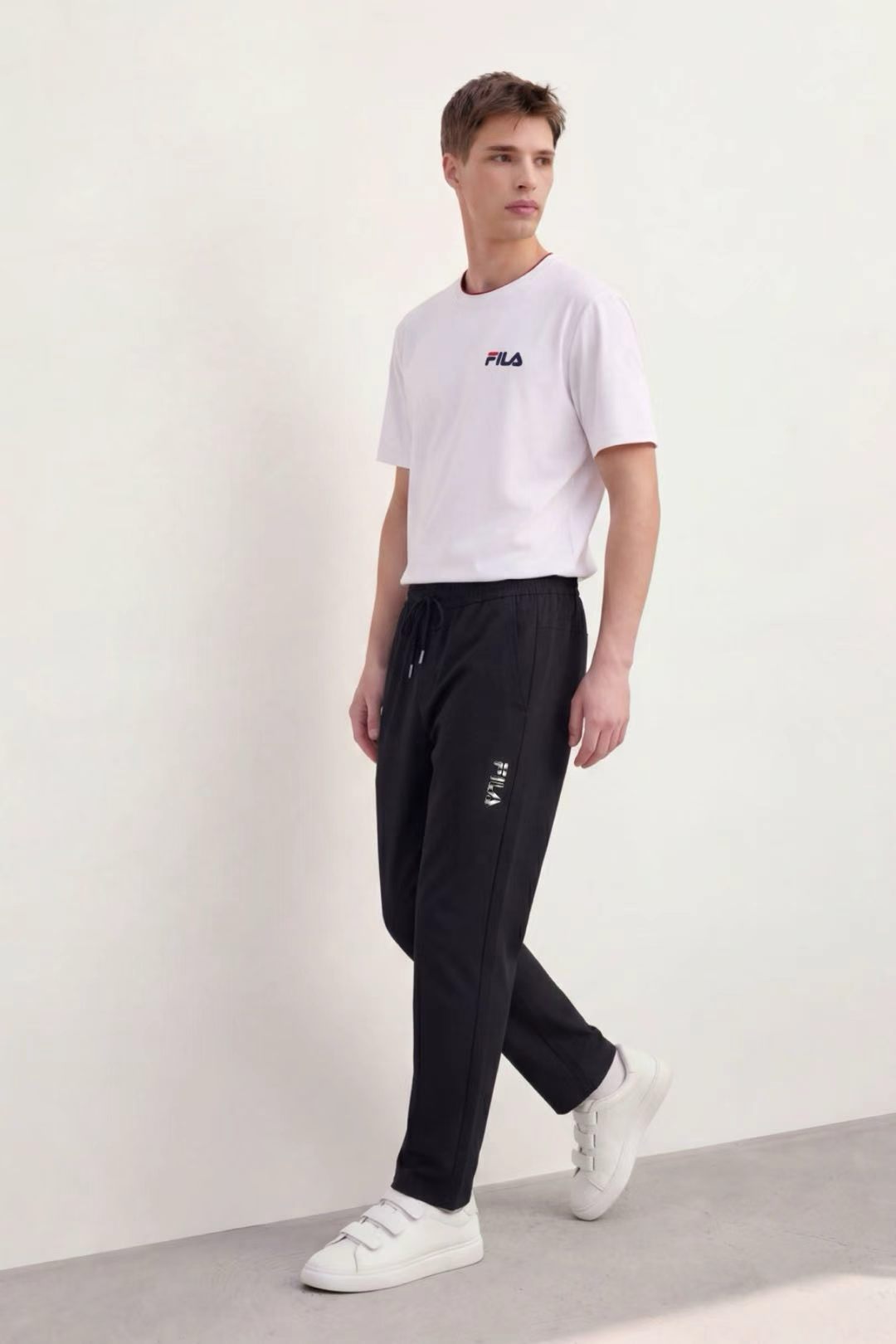 FL017-2026 FILA  Quần dài nam dáng ôm mới